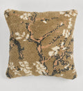 Decorative pillow with floral pattern on a plain background