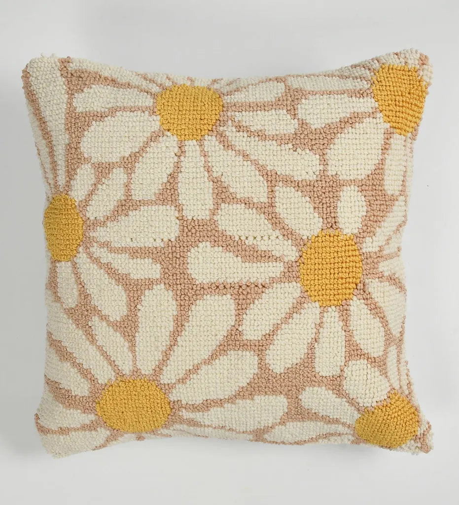 Decorative pillow with floral pattern on a plain background